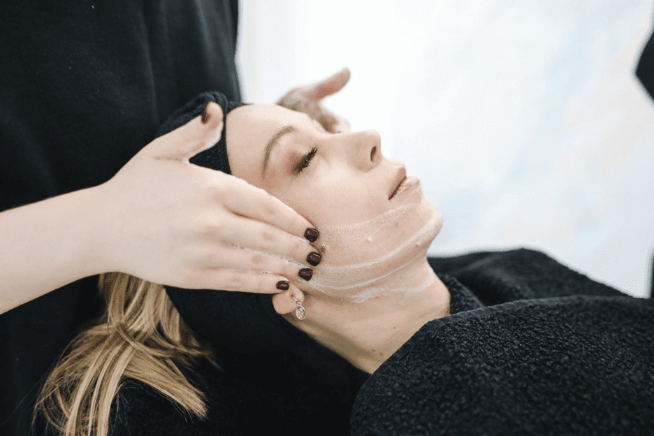 woman at the spa receiving a CBD facial