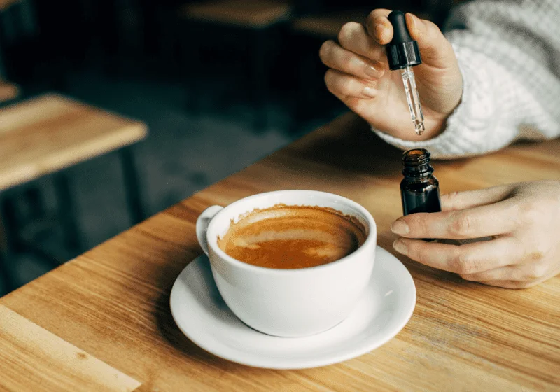 cbd oil drops into coffee