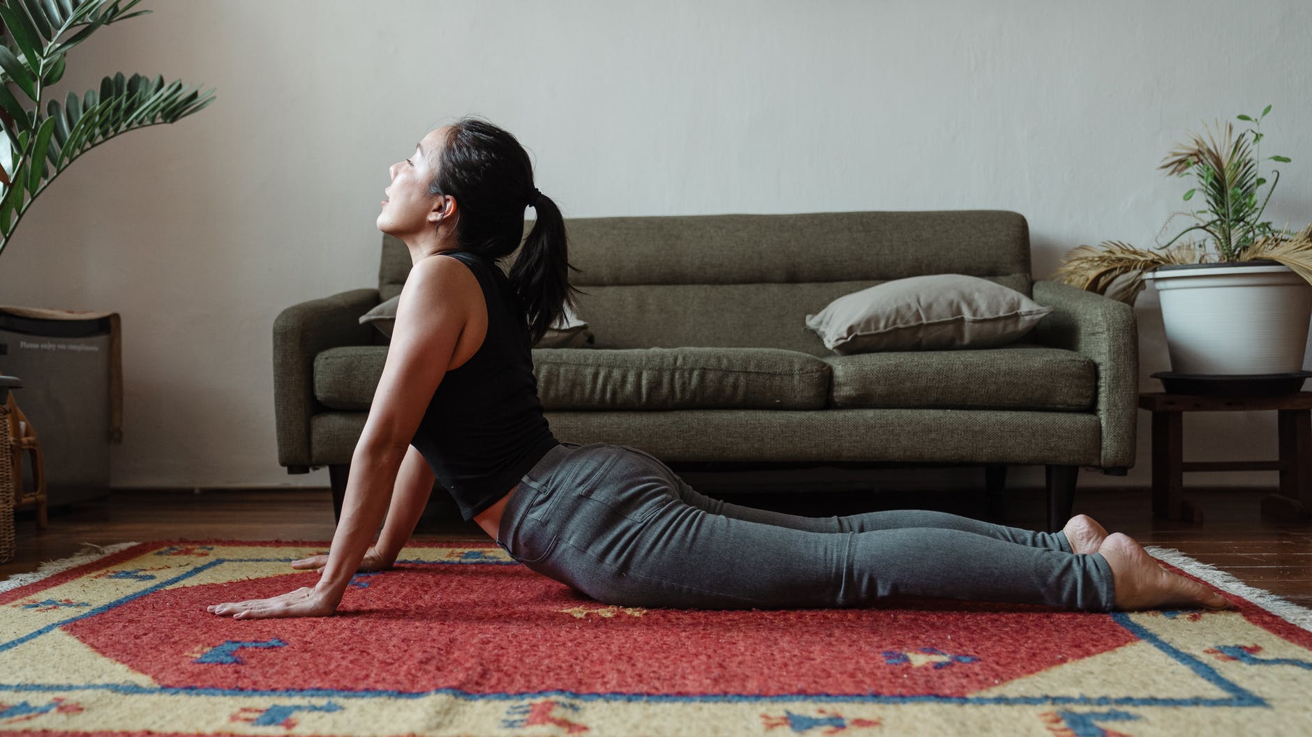 young asian woman doing yoga pose