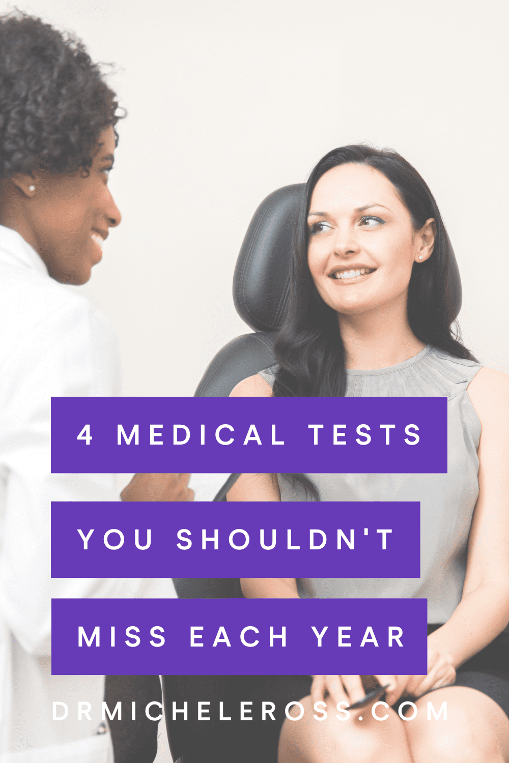 woman passing vision test at annual medical exam with doctor