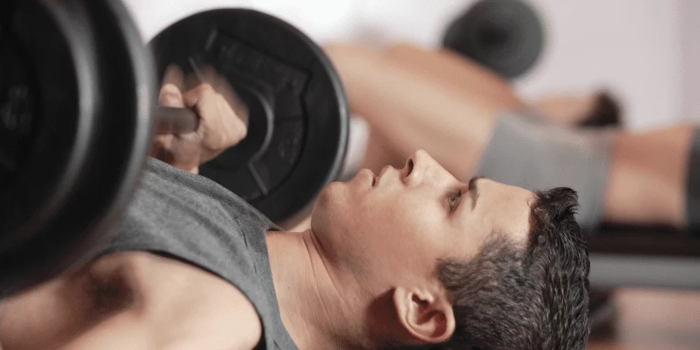 young man weight lifting