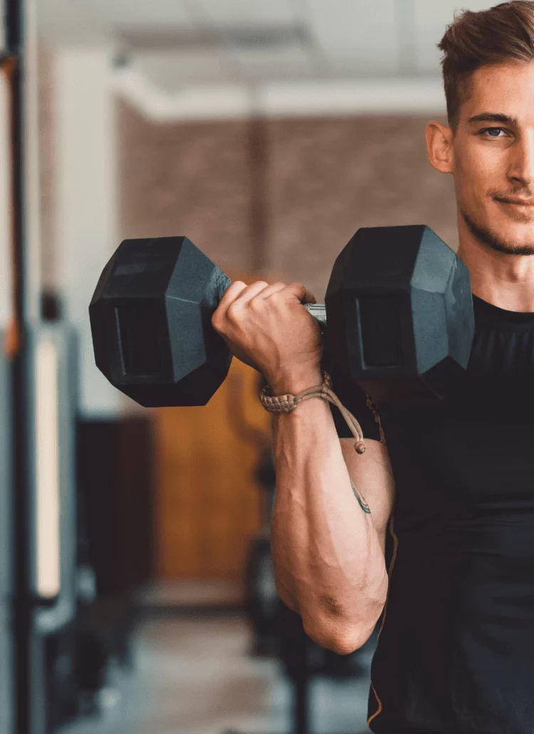 young man weight lifting higher testosterone