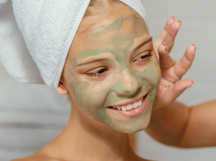 women applying kratom face masks to their skin