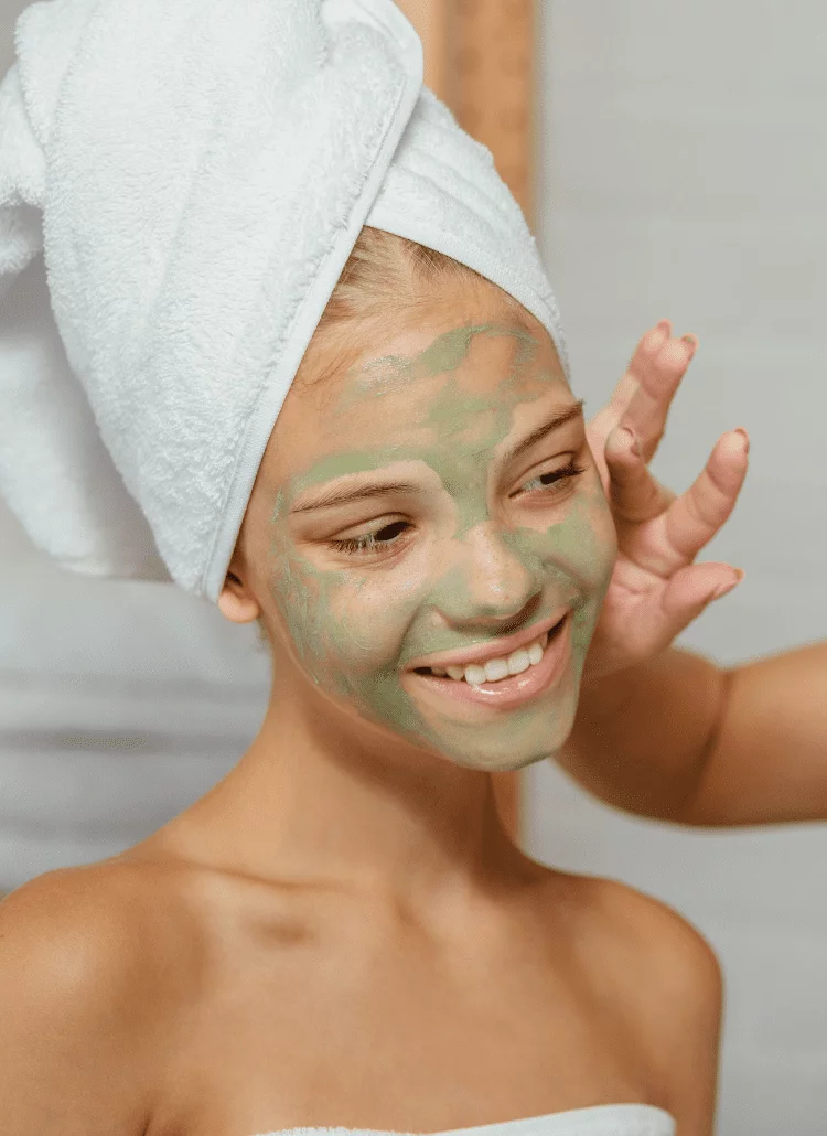 women applying kratom face masks to their skin