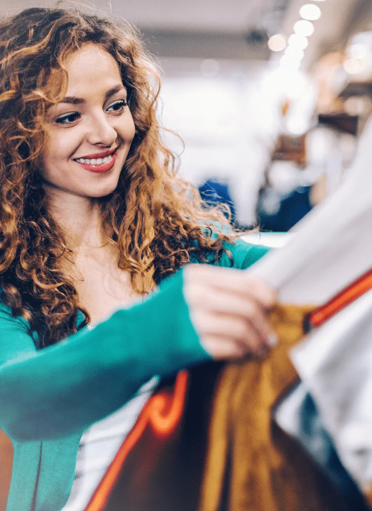 woman shopping for good fitting clothes