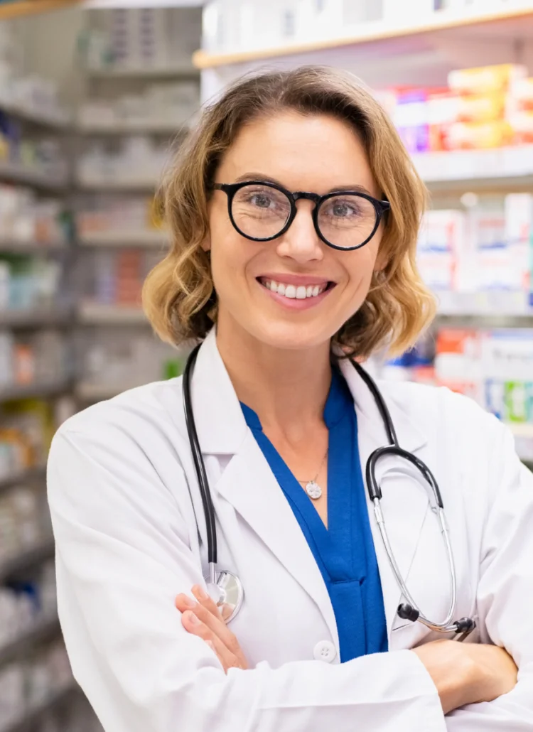 young female pharmacist with glasses ready to help patients with chronic conditions
