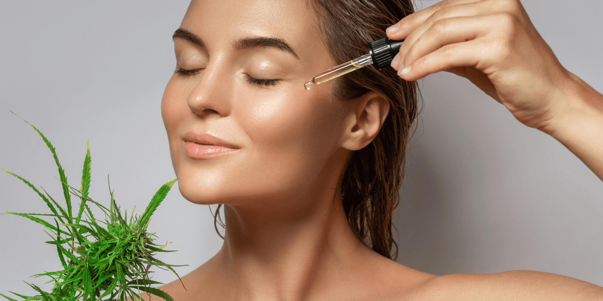 young woman applying cbd oil to face to fight premature aging and wrinkles