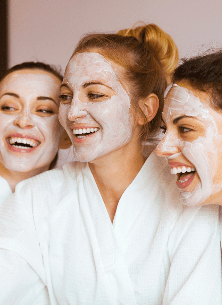 women pampering themselves with face masks selfcare
