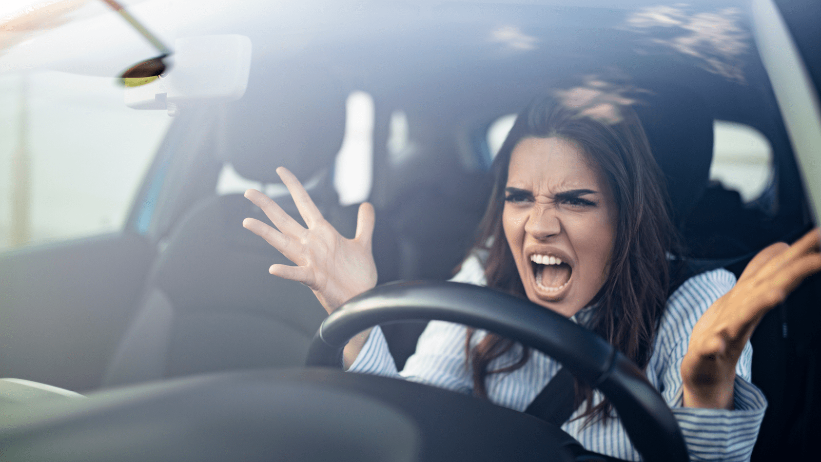 young indian woman can't control her anger issues in the car