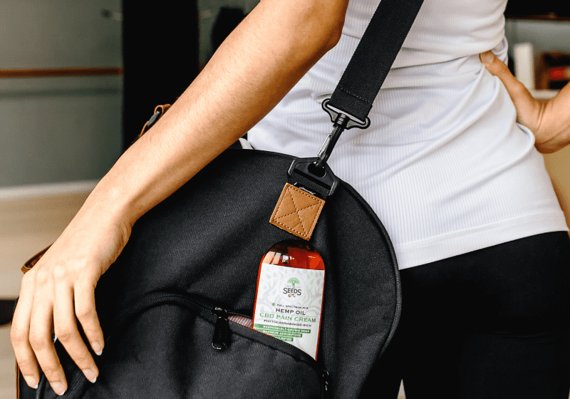 woman going to gym with cbd oil in her gym bag