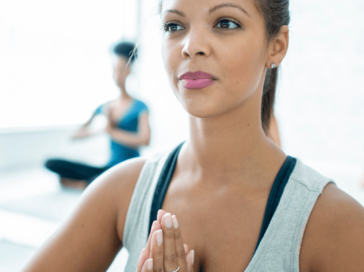 young sober woman doing yoga