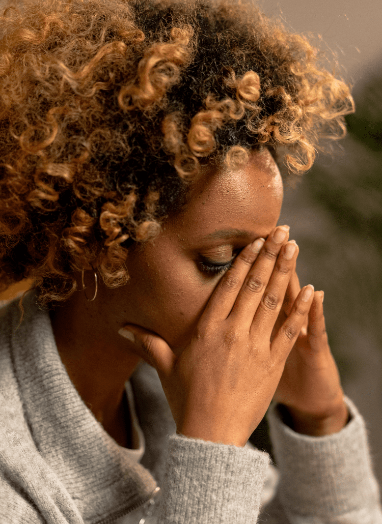 black woman stressed out needs cbd vape pen
