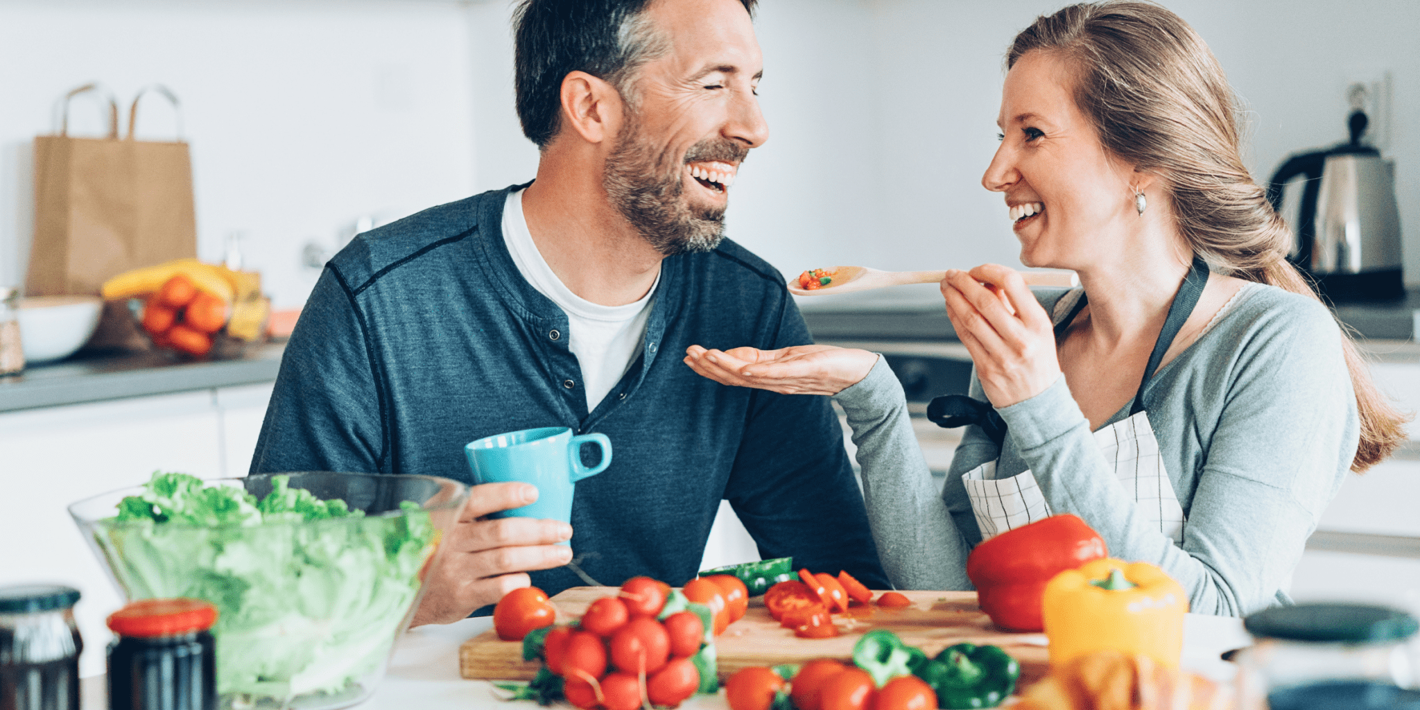 wife feeding husband over 50 healthy food