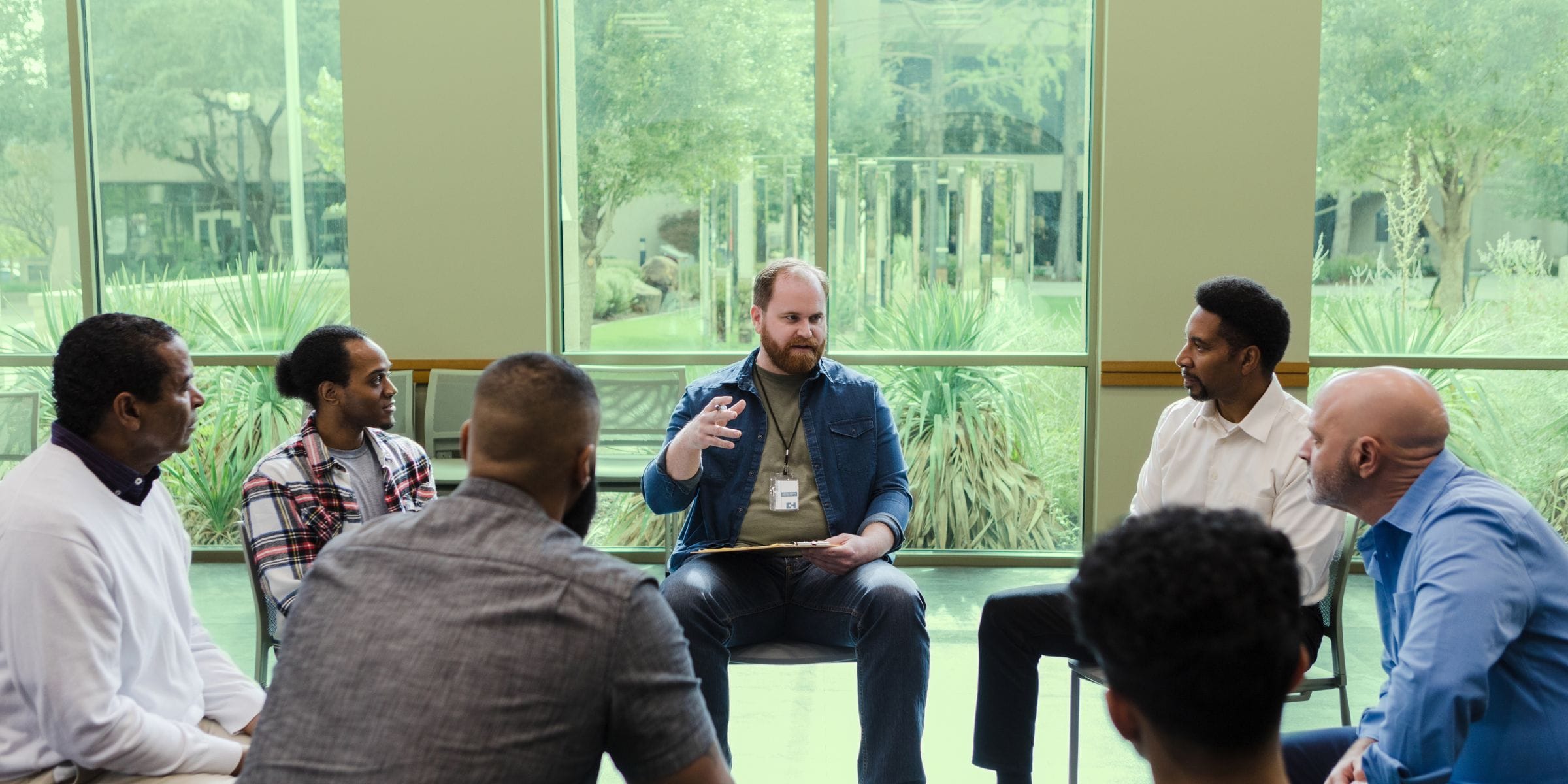 men talking about their feelings in a support group