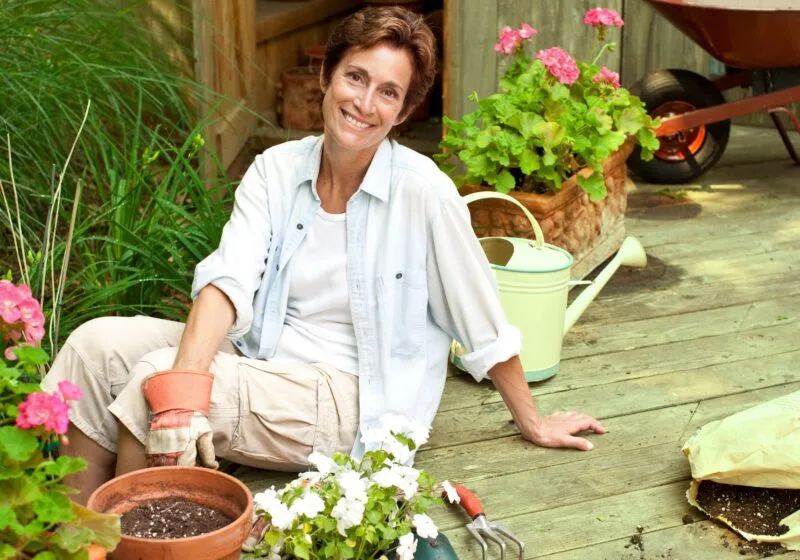 senior women enjoying her gardening hobby