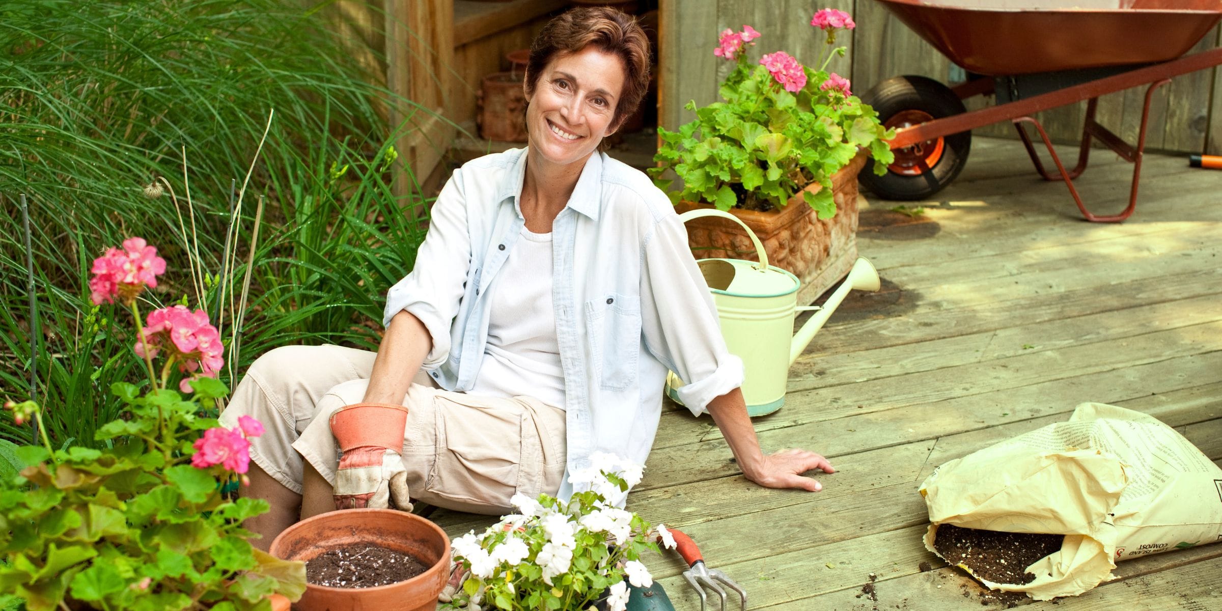 senior women enjoying her gardening hobby