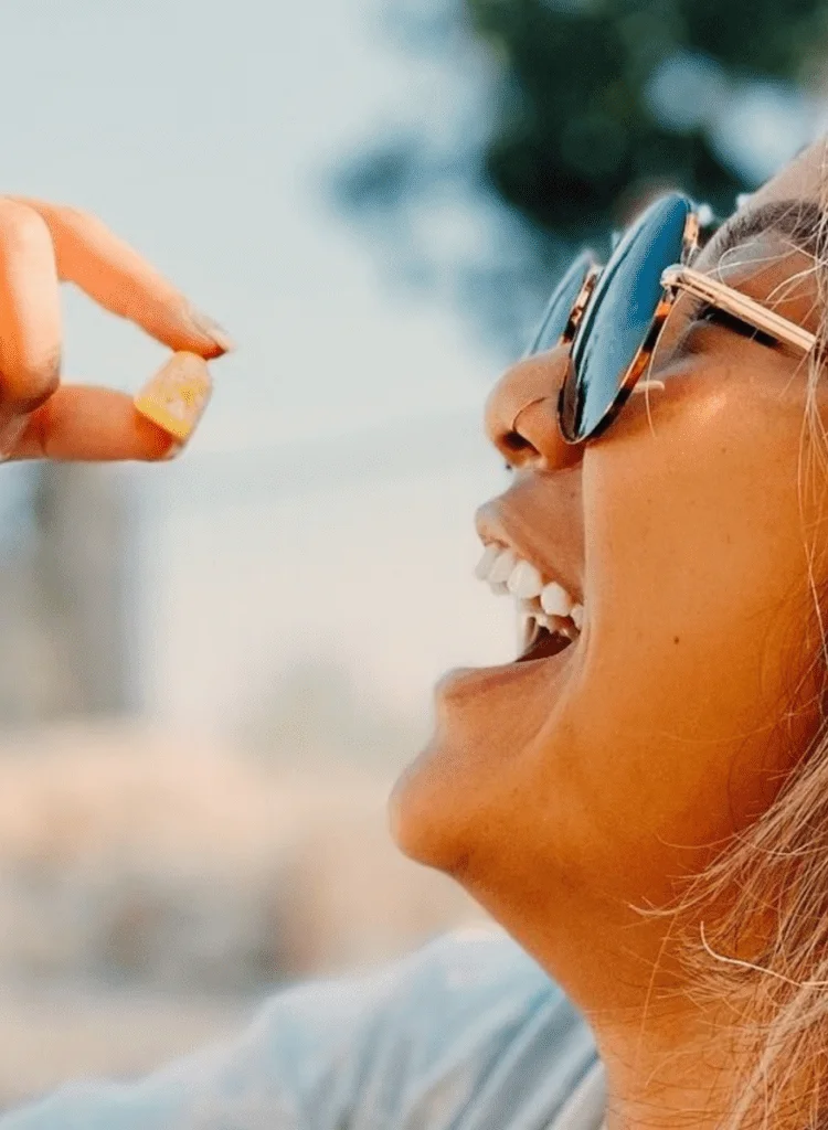 pregnant woman eating CBD gummies