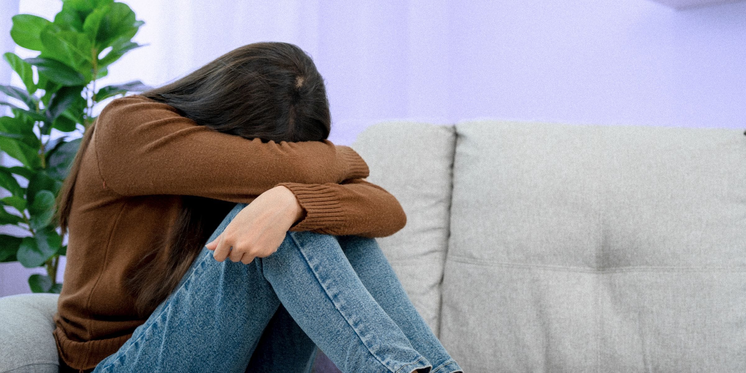 depressed woman hiding faced embarrassed recovering alcoholic