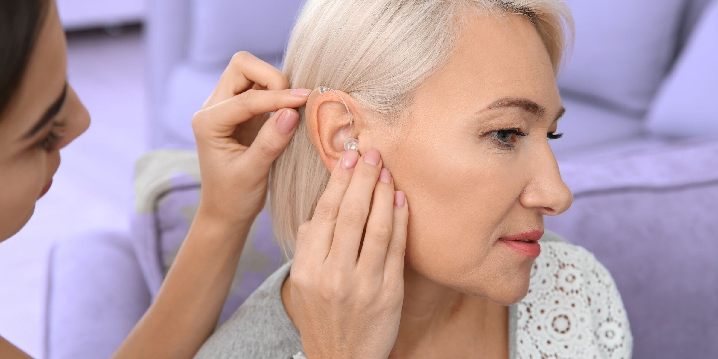 woman is self-conscious wearing hearing aides in public for the first time needs confidence boost