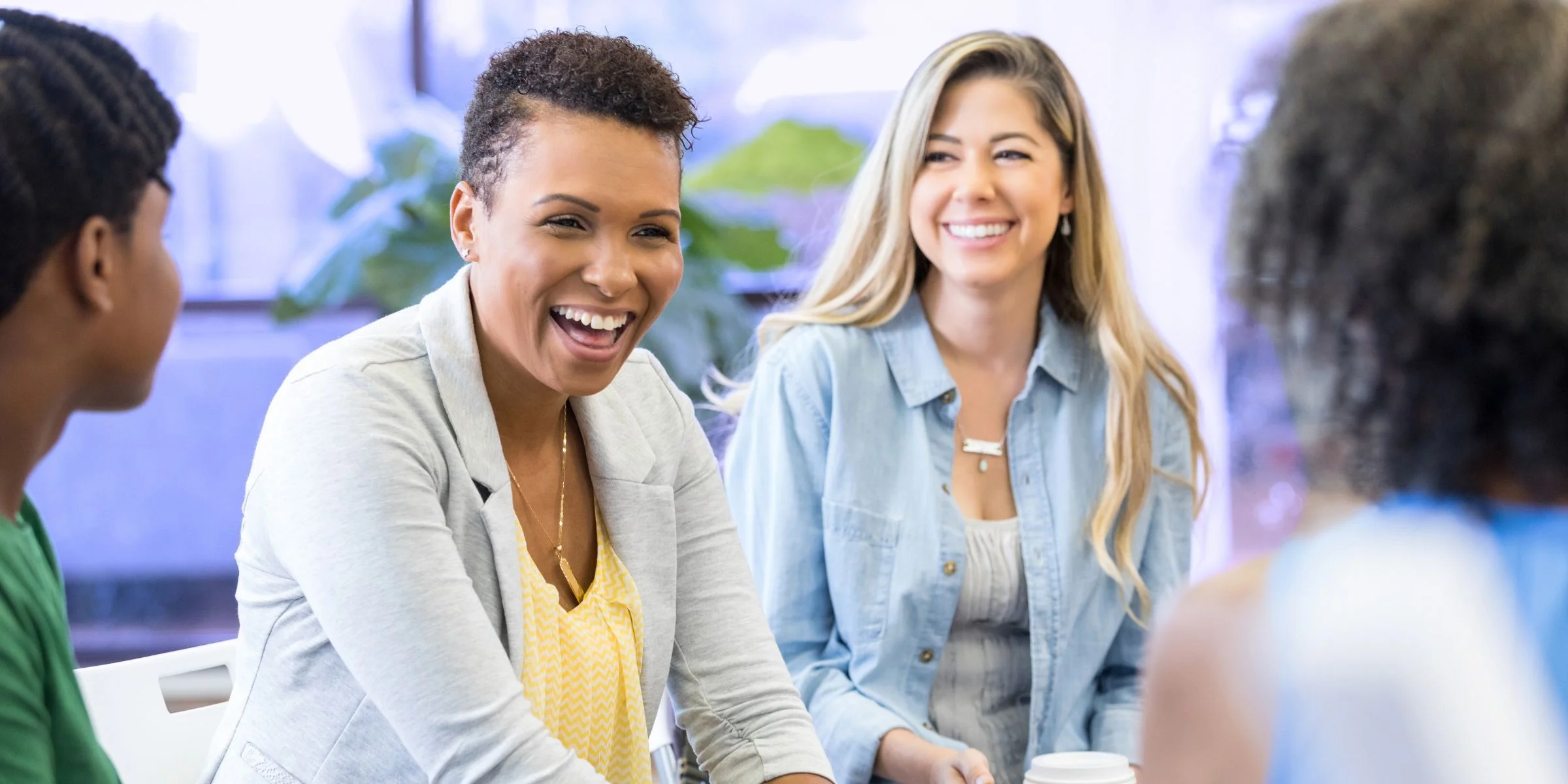 women in group therapy to address burnout and manage stress better
