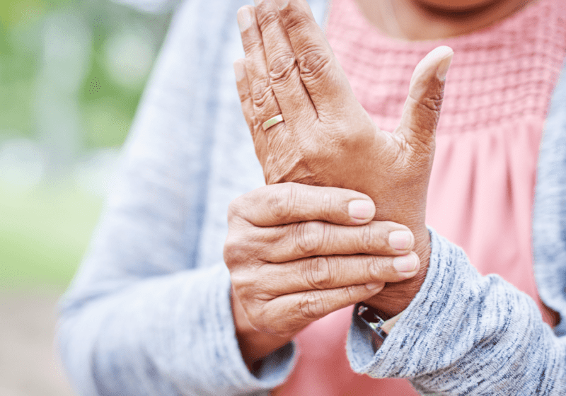 senior woman holding arthritis hand needs steroids for pain