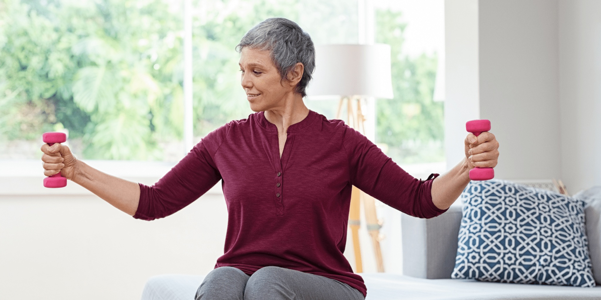 grandma lifting pink weights strength training safely