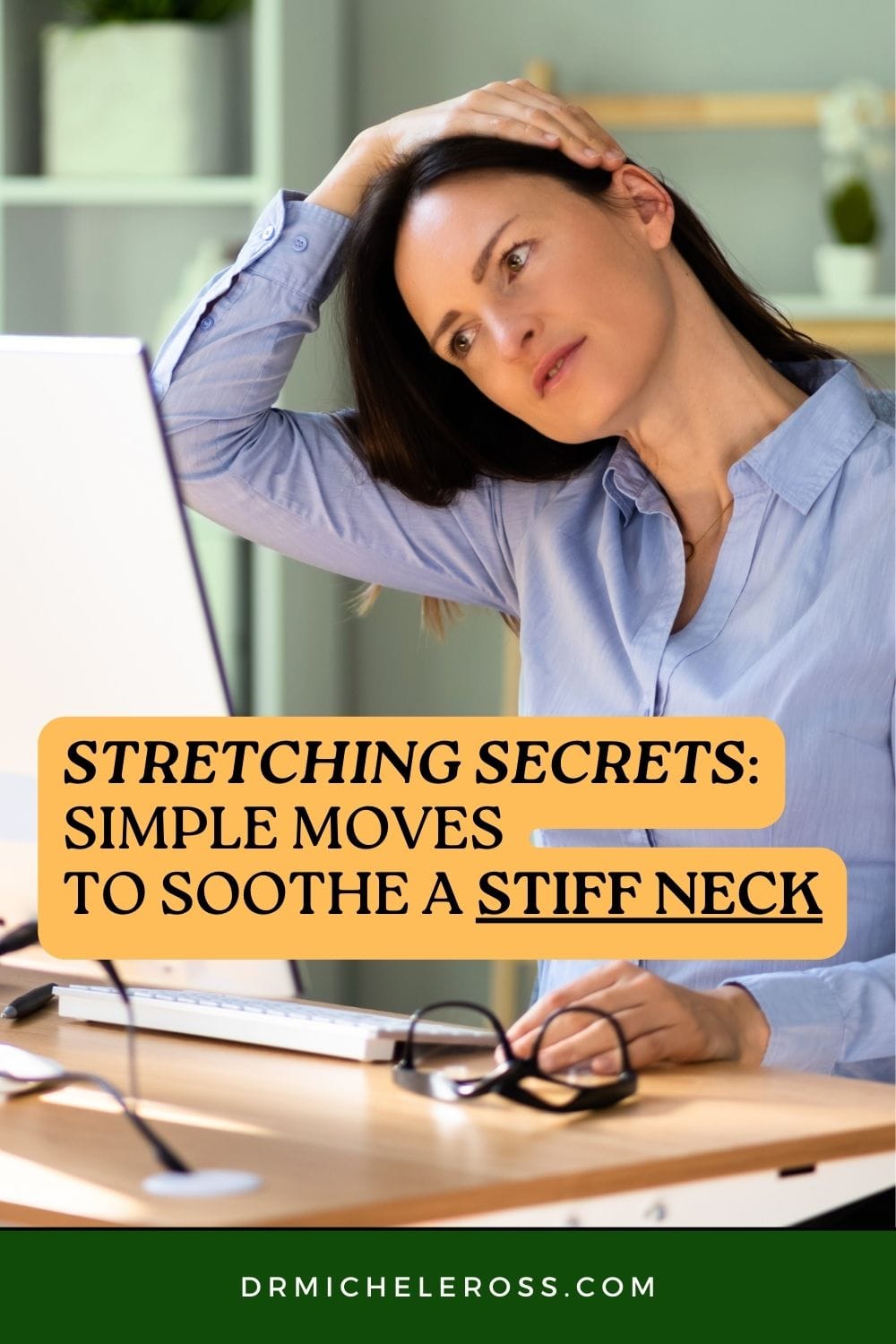 executive woman stretching a stiff neck while sitting behind an office computer