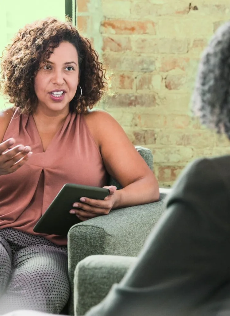 female psychologist helping patient with mental health and stress issues
