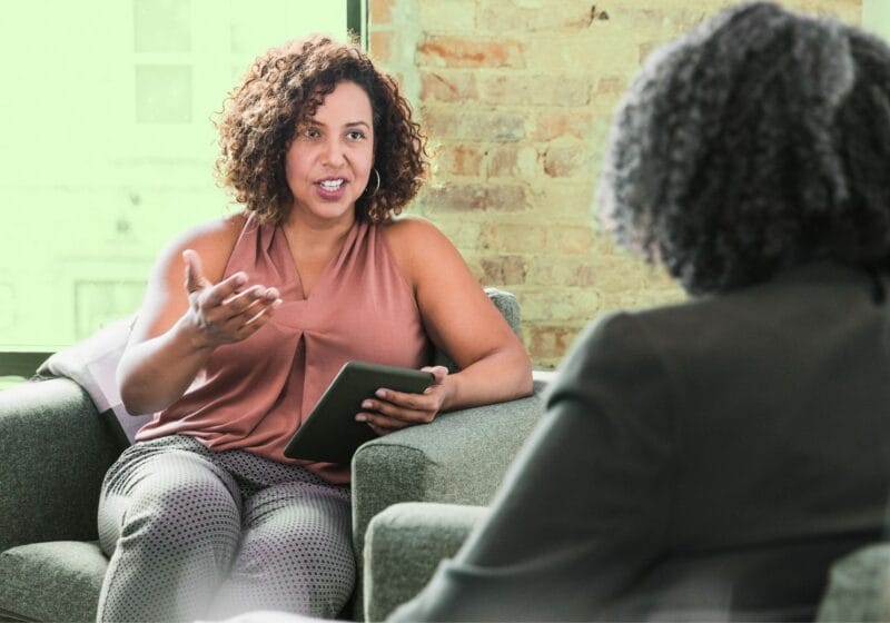 female psychologist helping patient with mental health and stress issues