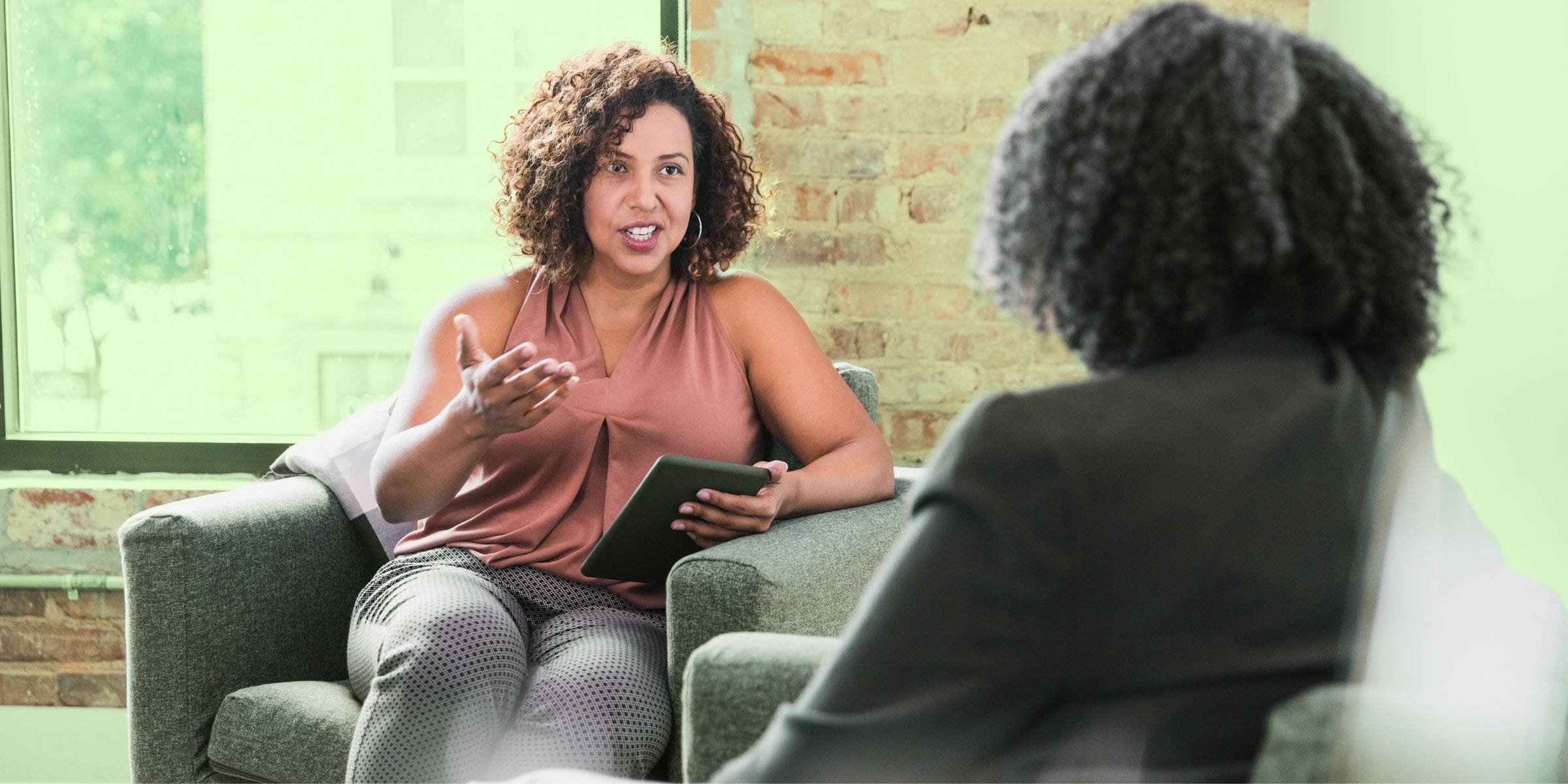 female psychologist helping patient with mental health and stress issues