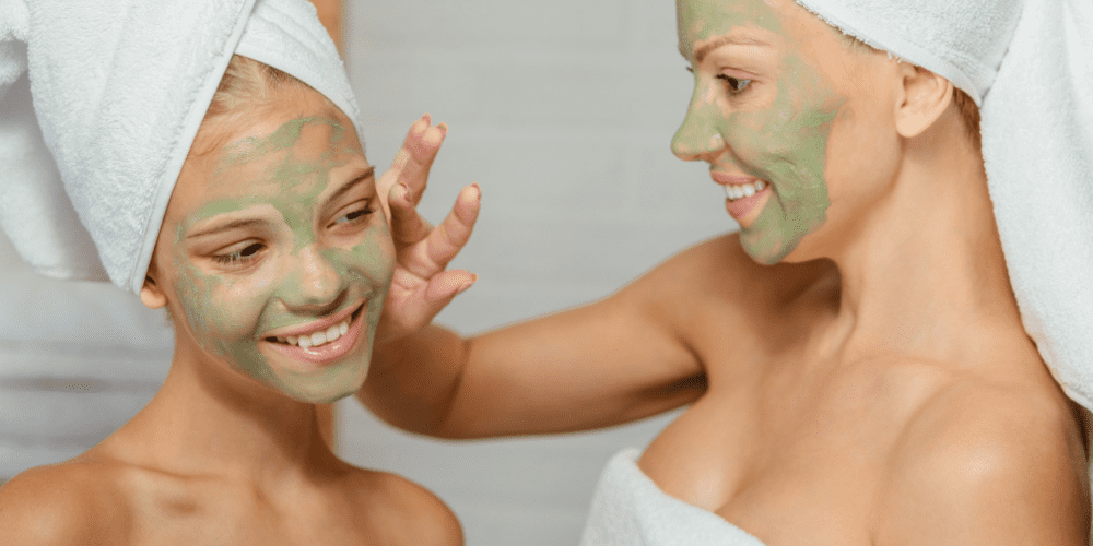 women applying kratom face masks to their skin