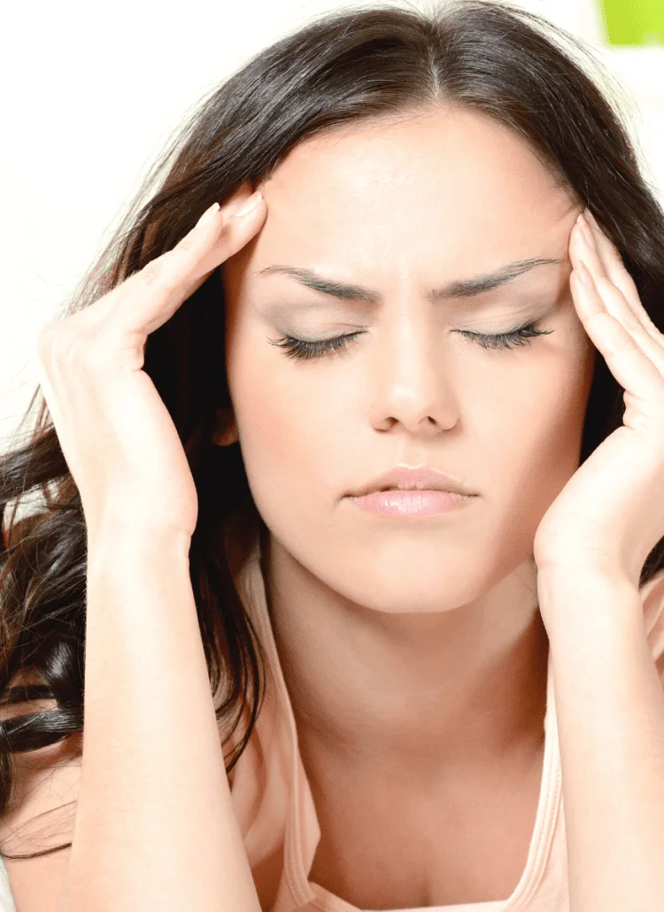 young woman with migraine headache
