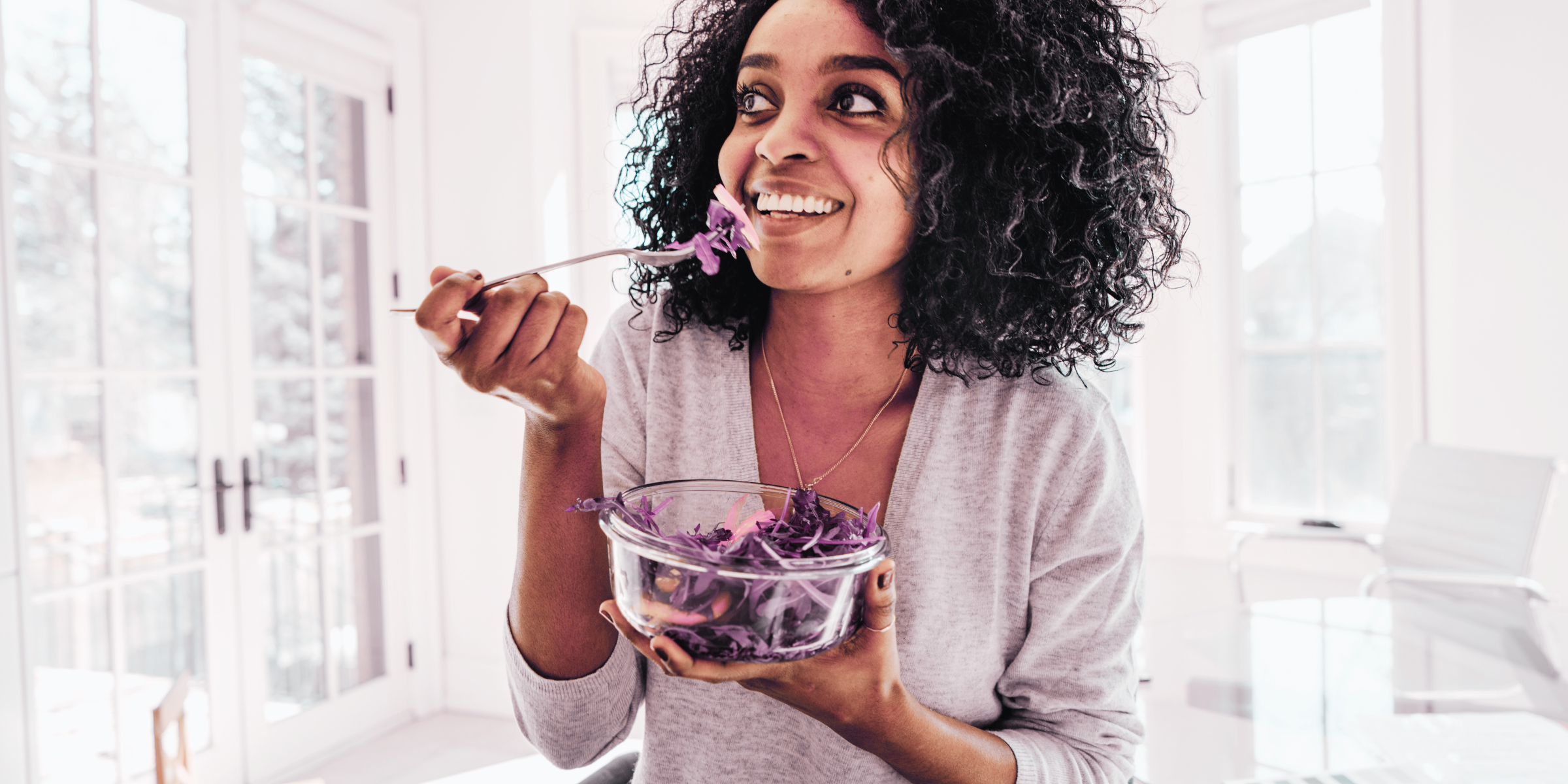 indian woman eating cabbage salad healthy habits