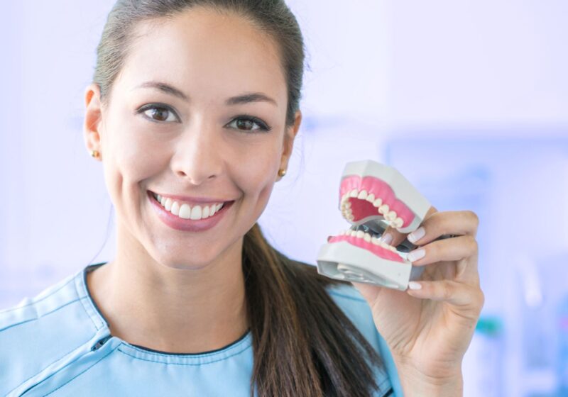 female orthodontist explain what gum disease and dental treatment are