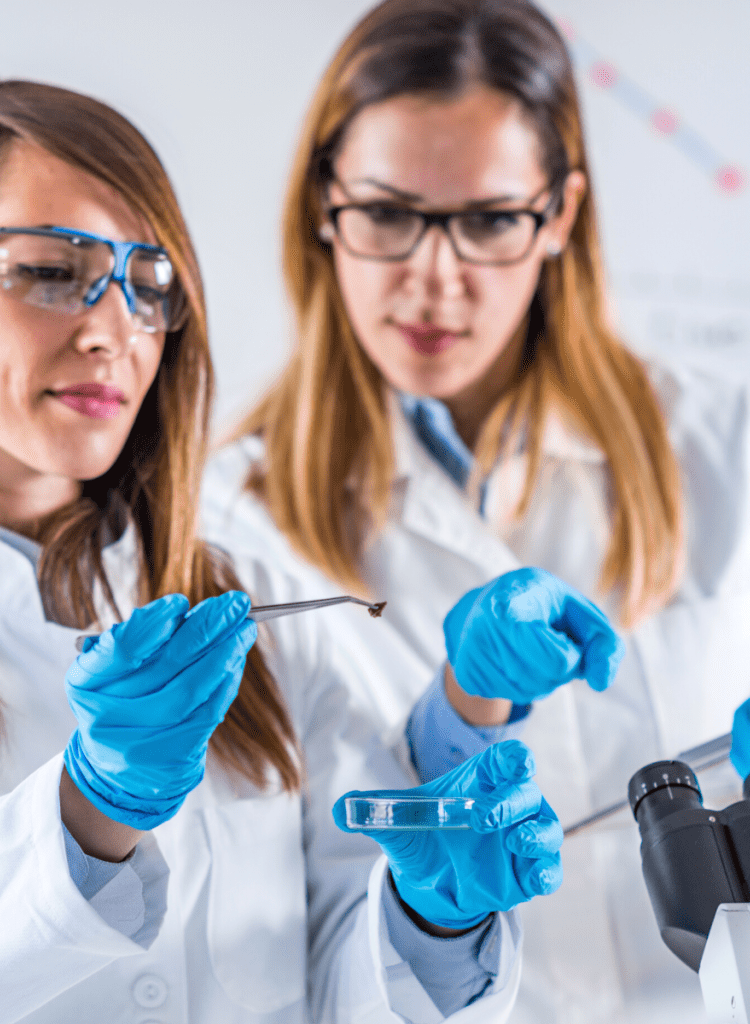 women scientists researching covid-19 impact on health industry in 2023