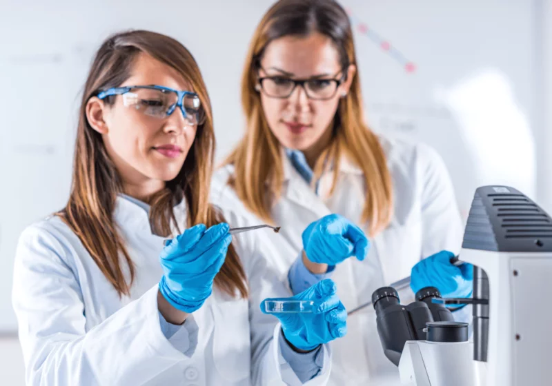 women scientists researching covid-19 impact on health industry in 2023