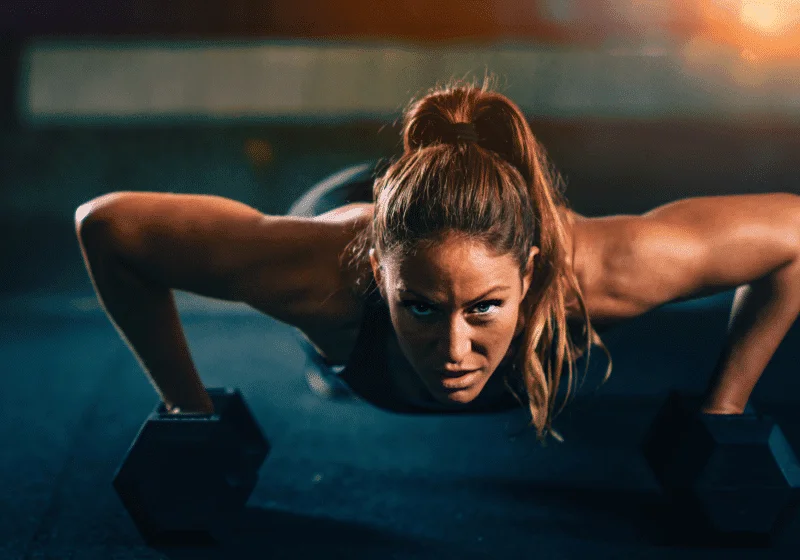 woman doing pushup high on cannabis