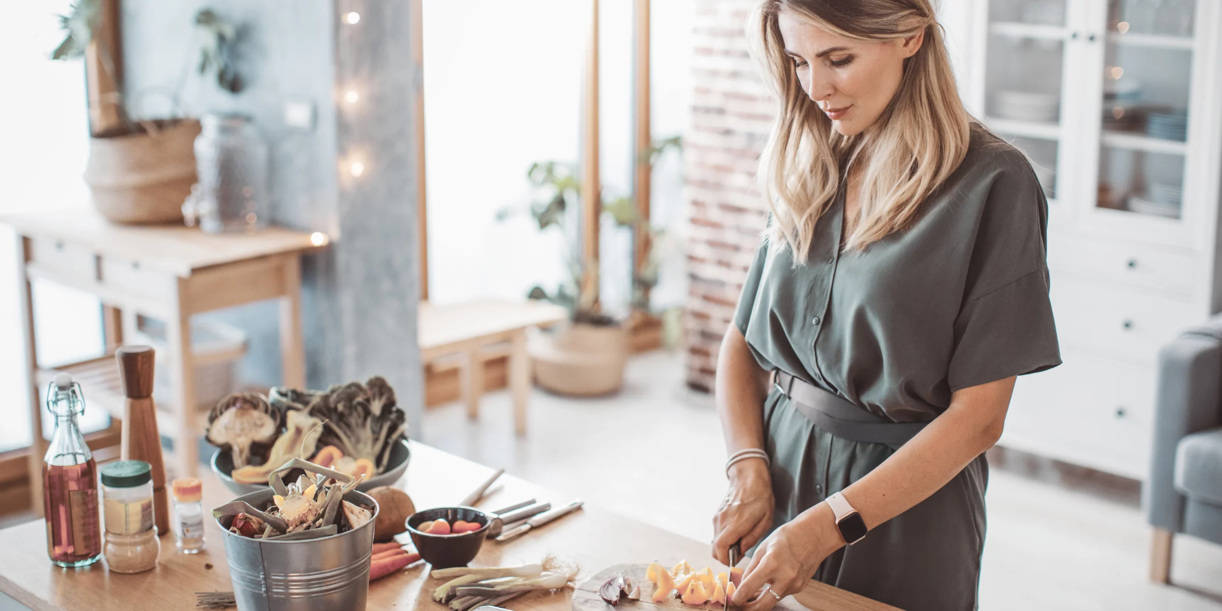 woman living a healthy lifestyle by cooking healthy meals at home
