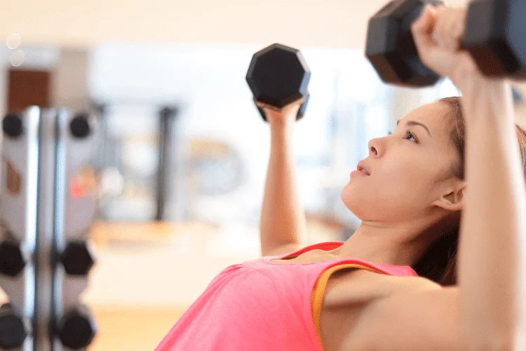 woman exercising at the gym