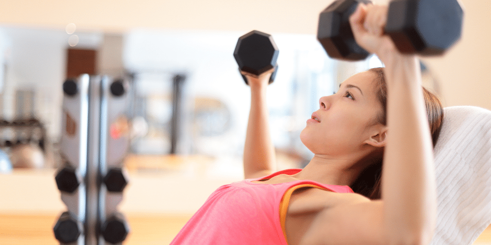 woman exercising at the gym