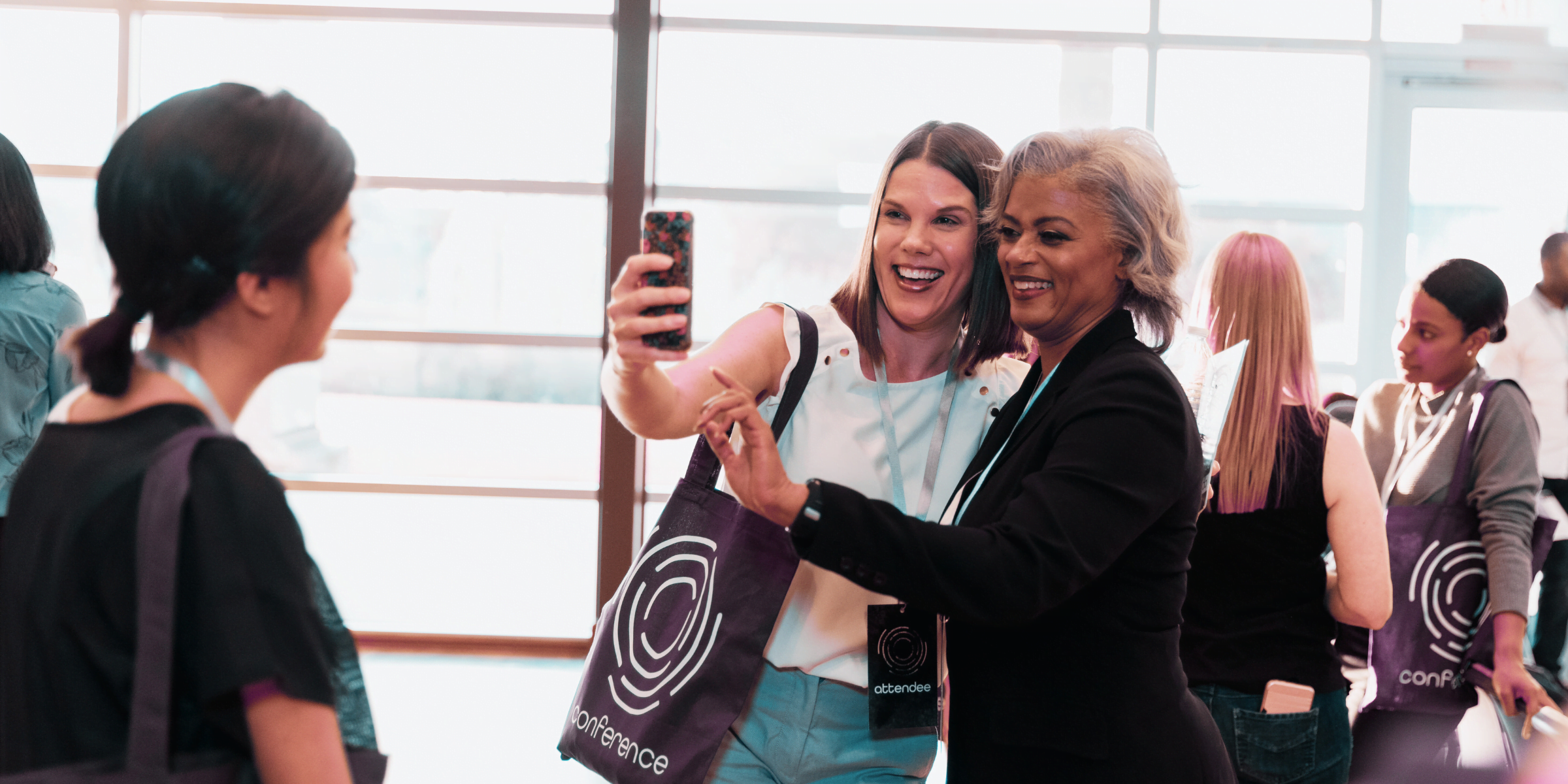 women networking with purpose with at a business conference
